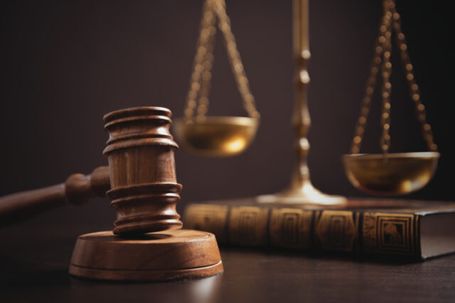 Judge's gavel and scale. Law and justice system